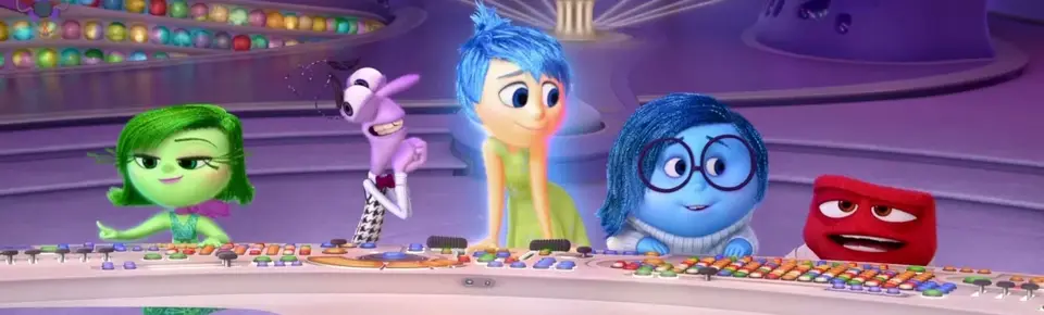 Five 3D characters, representing disgust, fear, joy, sadness, and anger, sit in front of a complex control panel.